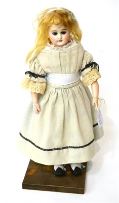 Lot 11 - A German Bahr & Proschild bisque shoulder head doll, impressed '309.5', with original blond...