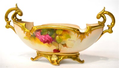 Lot 59 - A Royal Worcester rose pattern twin handled oval bowl, numbered 254, signed Spilsbury