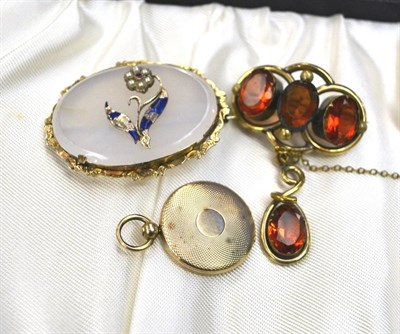Lot 88 - A group of three Victorian pieces of jewellery including a yellow metal mounted brooch/pendant...
