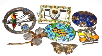 Lot 95 - Six silver and enamel brooches including a butterfly (worn), buckle, floral, bird of paradise,...