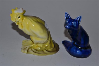 Lot 129 - A Royal Doulton blue Flambe glazed seated fox, printed factory marks, 10cm and a Royal Doulton...