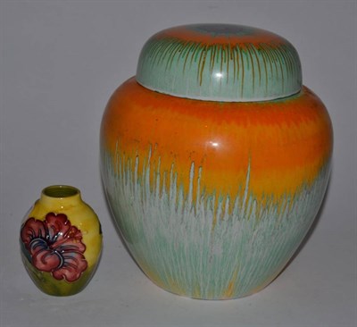 Lot 130 - A Shelley drip glazed ginger jar and cover and a small Moorcroft vase (2)
