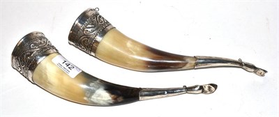 Lot 142 - A pair of early 20th century Russian drinking horns with silver coloured metal mounts