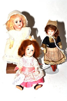 Lot 144 - A German Recknagel bisque socket head doll, impressed '1097' '17/0', with original blond wig,...
