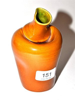Lot 151 - A Linthorpe pottery jug, designed by Dr Christopher Dresser, shape no. 267, green and brown...