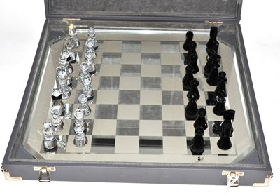 Lot 160 - A Swarovski silver crystal chess set including board