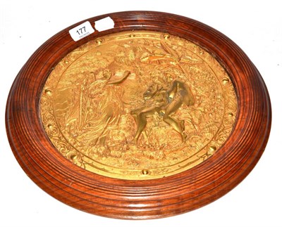 Lot 177 - A gilt bronze plaque depicting Adam & Eve in a moulded circular walnut frame