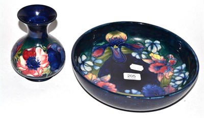 Lot 205 - A Moorcroft Anemone pattern squat vase with painted signature and impressed factory marks...