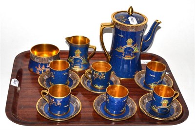 Lot 206 - A Carlton ware jeweled blue and gilt coffee set