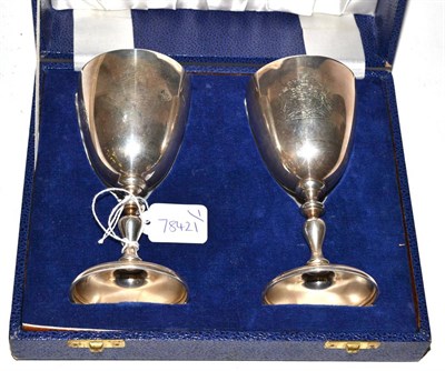 Lot 224 - A pair of cased silver limited edition goblets commemorating the Queens Jubilee, cased