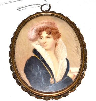 Lot 243 - Oval portrait miniature of lady with feather in hair and lace collar