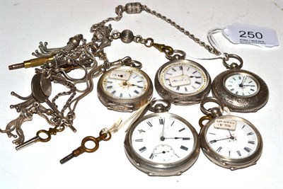 Lot 250 - Three lady's fob watches with attached white metal chains and tassels, cases stamped 935 and...