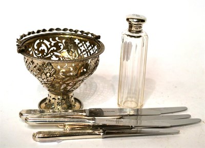 Lot 268 - A pierced silver basket and silver lidded toilet jar and six knives