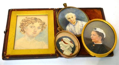 Lot 269 - Four various portrait miniatures of women, variously framed