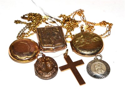 Lot 273 - Four lockets, a gold cross and a St. Christopher