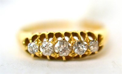 Lot 284 - An 18ct gold diamond five stone ring