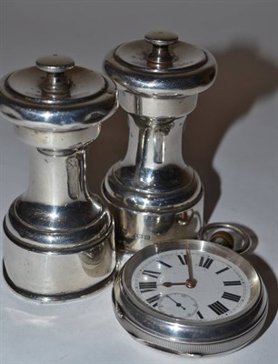 Lot 291 - Two silver pepper grinders and a silver pocket watch