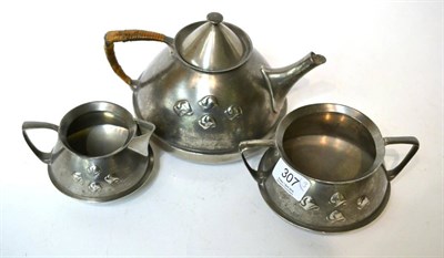 Lot 307 - Archibald Knox (1864-1933) for Liberty & Co., a pewter three piece teaset, model No.0303, cast...