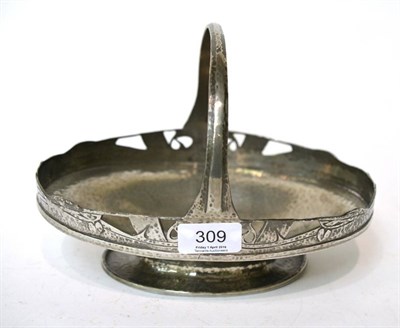 Lot 309 - Archibald Knox (1864-1933) for Liberty & Co., A pewter cake basket, Model No.01172, hand beaten...