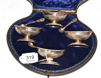 Lot 319 - A cased set of four silver salts