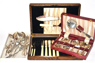 Lot 323 - A quantity of silver flatware consisting of tablespoons, teaspoons, forks, cased silver dessert set