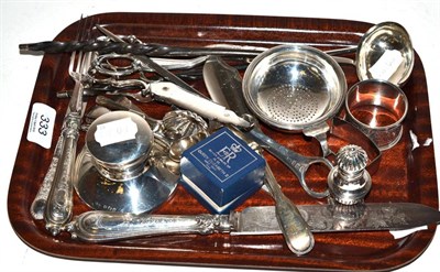 Lot 333 - A quantity of silver including, a George III silver meat skewer, capstan inkwell, wine funnel...