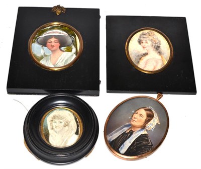 Lot 344 - Four oval miniature portraits of women, variously framed