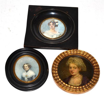 Lot 345 - A 19th century Continental miniature portrait on ivory depicting a young woman, head and shoulders