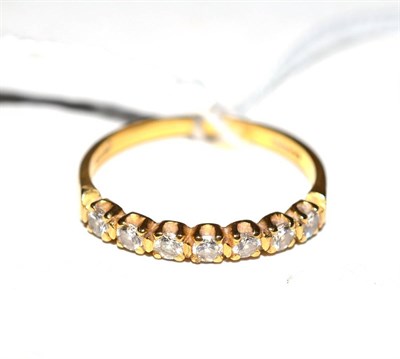 Lot 373 - An 18ct gold diamond half loop ring, total estimated diamond weight 0.35 carat approximately