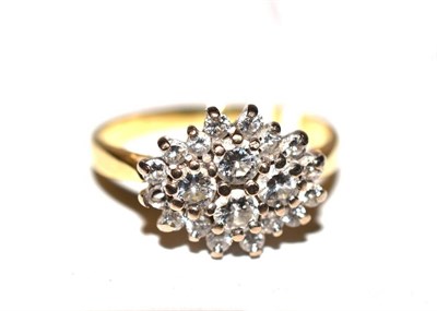 Lot 375 - An 18ct gold diamond cluster ring (one diamond missing)