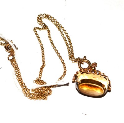 Lot 381 - A smokey quartz fob on a belcher chain