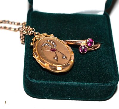 Lot 397 - A 9ct gold garnet and seed pearl locket on a belcher chain, stamped '9C' and a garnet two stone...