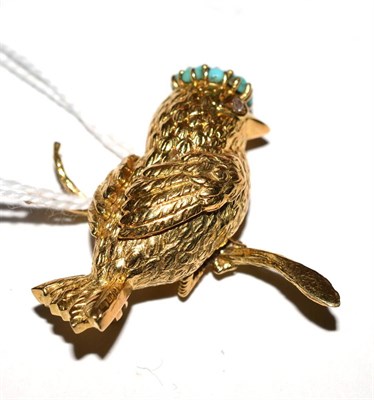 Lot 401 - An 18ct gold bird brooch, with turquoise and diamond inset