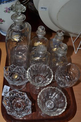 Lot 458 - Five Georgian decanters with gilt decoration and two pairs salts and a wine glass