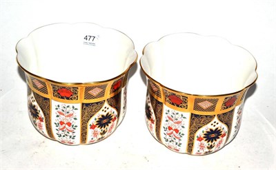 Lot 477 - A pair of Royal Crown Derby old Imari cache pots, pattern number 1128