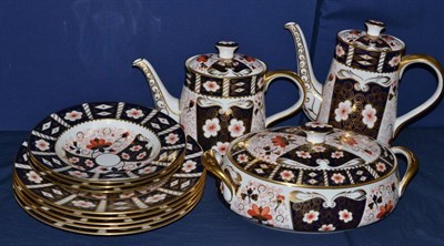 Lot 482 - A group of Royal Crown Derby dinner wares, pattern number 2451, comprising teapot, coffee pot,...