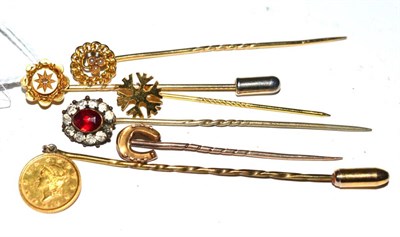 Lot 527 - Assorted stick pins, one with a gold dollar