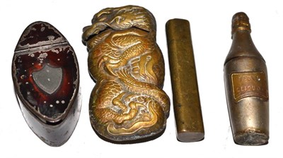 Lot 539 - A George III tole nutmeg grater, a vesta in the form of a dragon, a verve clicquot bottle vesta and