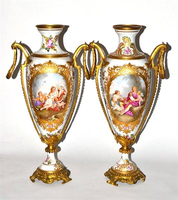 Lot 541 - A pair of gilt metal mounted sèvres style porcelain vases, early 20th century, of baluster...