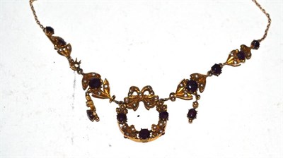 Lot 542 - An Edwardian amethyst and seed pearl necklace