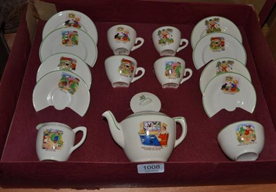 Lot 1008 - A child's pottery tea set in original box