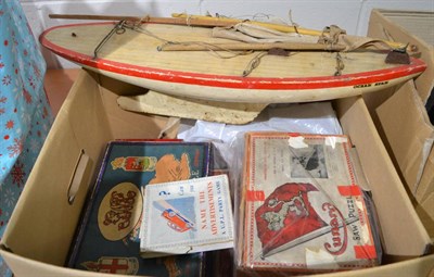 Lot 1020 - Assorted vintage jigsaws, games and pond yacht