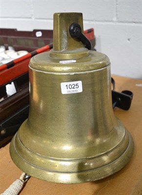 Lot 1025 - A brass ships bell with a painted cast iron bracket