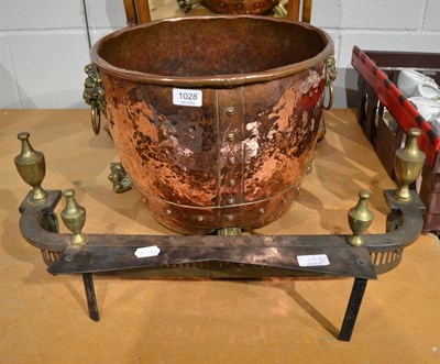 Lot 1028 - A large copper log bin together with a fender