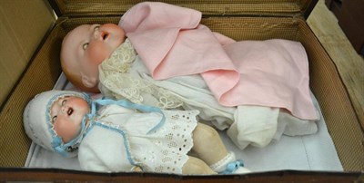 Lot 1047 - Armand Marseille flange head bisque head baby doll impressed 352 on fabric body and another...