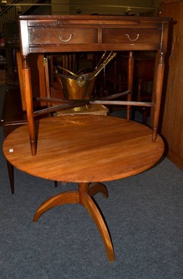 Lot 1074 - A modern two drawer writing table and a modern oak pedestal dining table