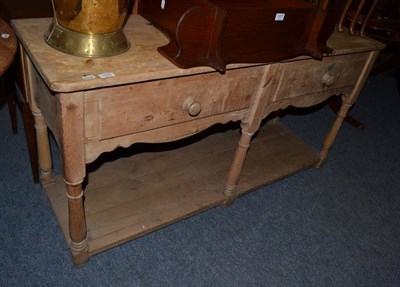 Lot 1075 - A pine two drawer kitchen side table