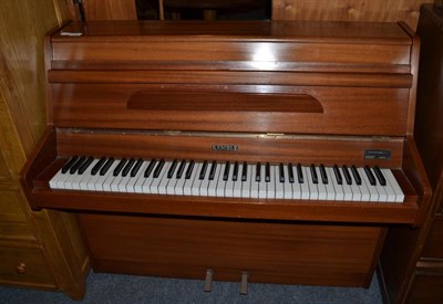 Lot 1082 - A Kemble teak cased upright piano