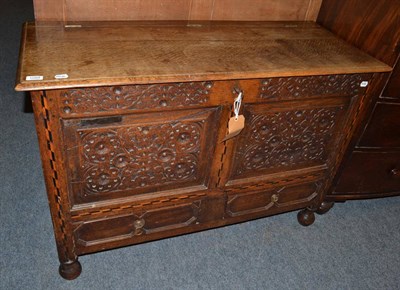 Lot 1094 - A 19th century checkered inlaid oak mule chest