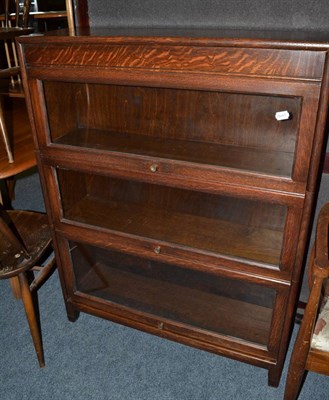 Lot 1103 - An early 20th century Globe Wernicke style oak three section bookcase